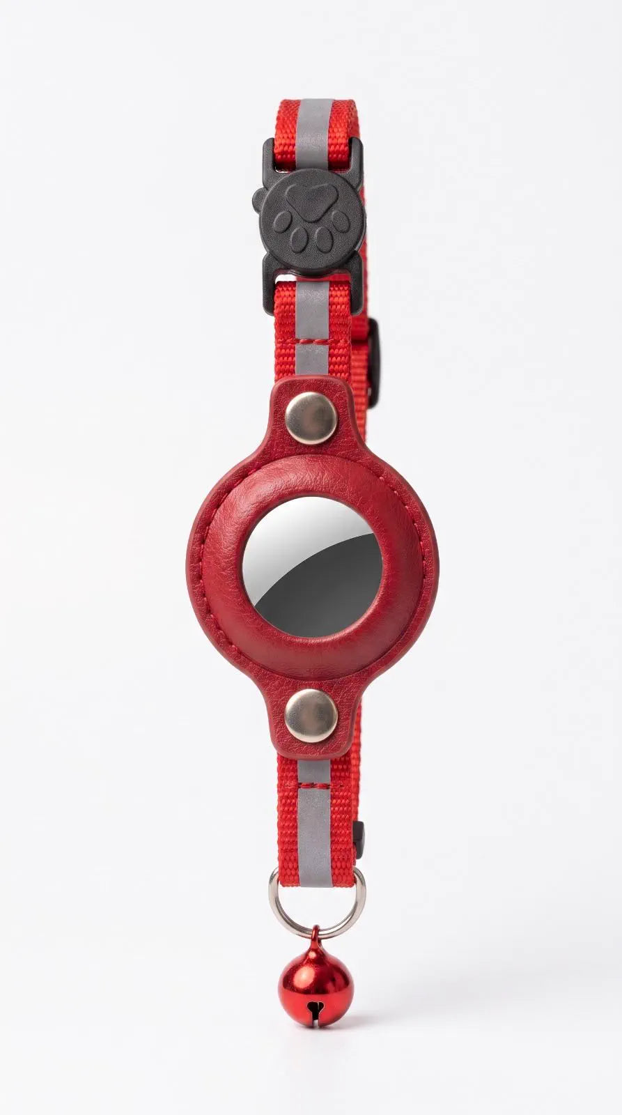 The Pawway collar laid flat: red reflective webbing, a paw-print side-release buckle, a round leather holder riveted on with two steel studs showing the tracker face, and a bell on a D-ring below.
